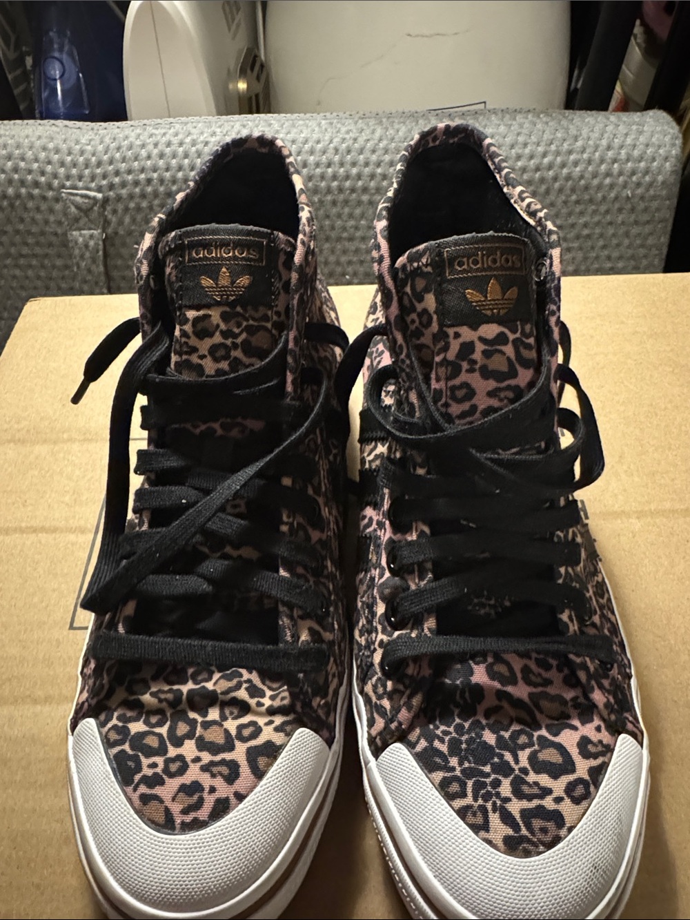 adidas Women’s Pink and Black Leopard High-Top Sneakers